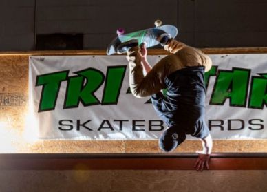Person doing a handplant